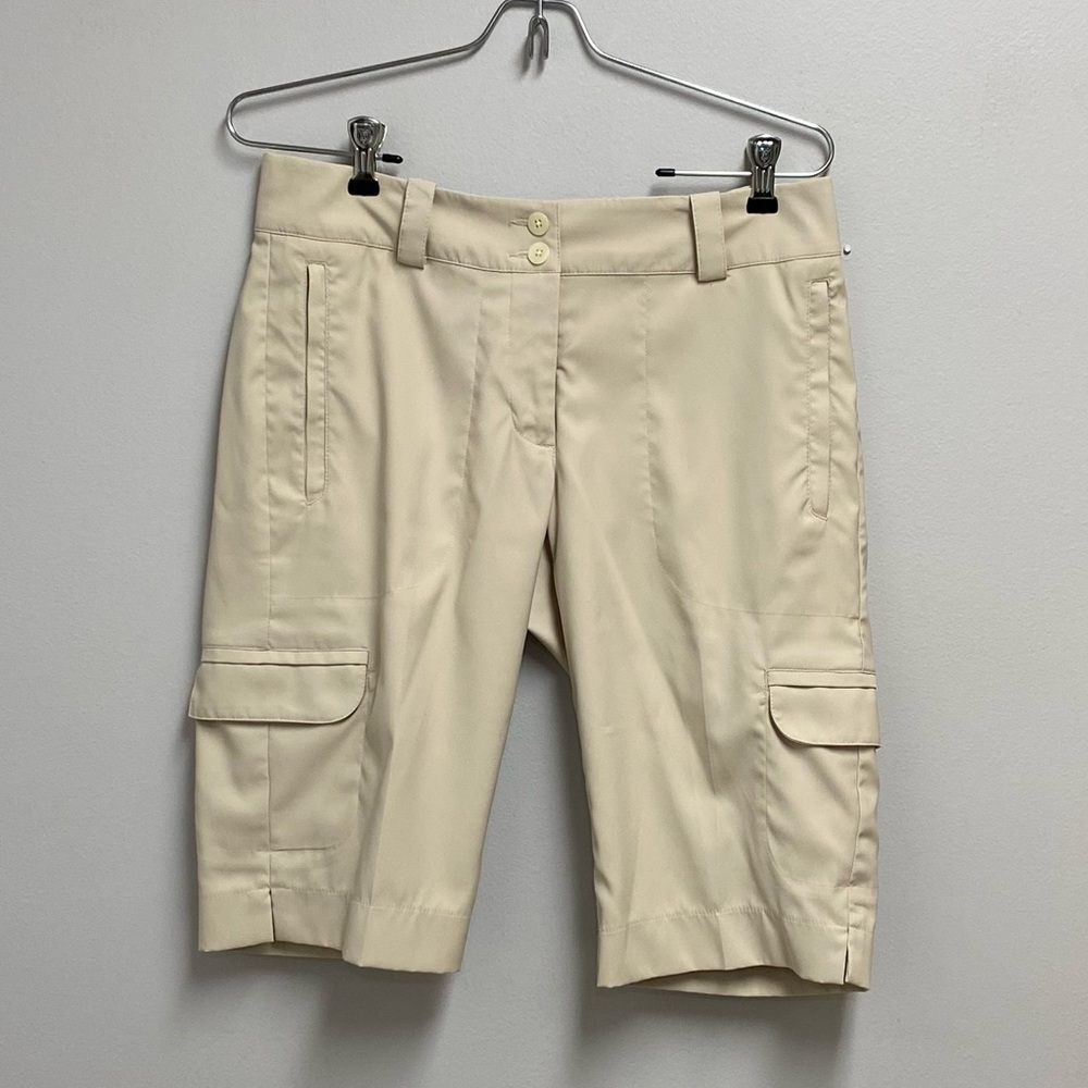Women’s Nike Dri-fit Golf cream shorts size 4.